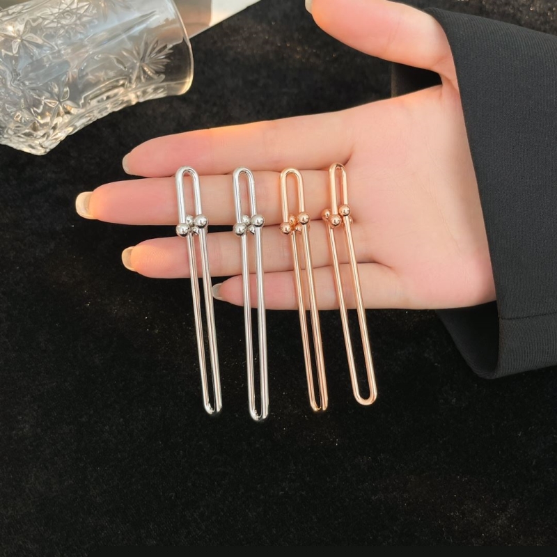 T*f*ny earrings